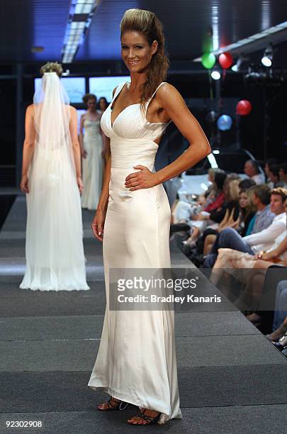 Model showcases a design on the catwalk by Princess For A Day during the Sunshine Coast Fashion Festival at the Coastline BMW Showroom on October 23,...