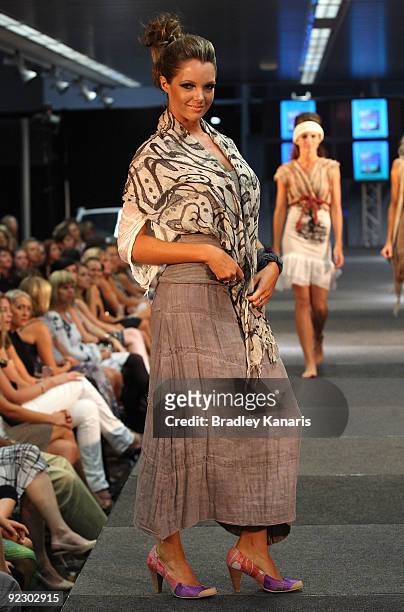 Model showcases a design on the catwalk by Eve on Earth during the Sunshine Coast Fashion Festival at the Coastline BMW Showroom on October 23, 2009...