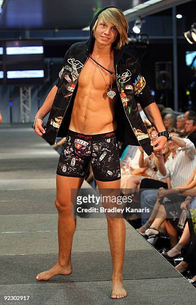 Model showcases a design on the catwalk by Ed Hardy during the Sunshine Coast Fashion Festival at the Coastline BMW Showroom on October 23, 2009 in...