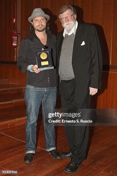 Director Nicolo Donato and producer Per Holst pose with the Farfalla d'oro Award at the Collateral Awards Ceremony during Day 9 of the 4th...