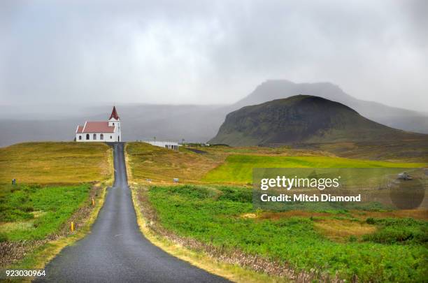 the famous church in hellnar iceland - hellnar stock pictures, royalty-free photos & images