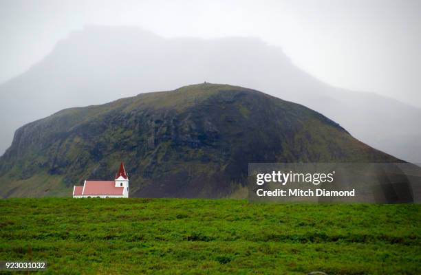 white church in hellnar iceland - hellnar stock pictures, royalty-free photos & images