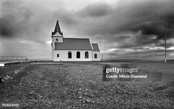 the famous church in hellnar iceland - hellnar stock pictures, royalty-free photos & images