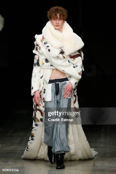 Model walks the runway at the Angel Chen show during Milan Fashion Week Fall/Winter 2018/19 on February 21, 2018 in Milan, Italy.