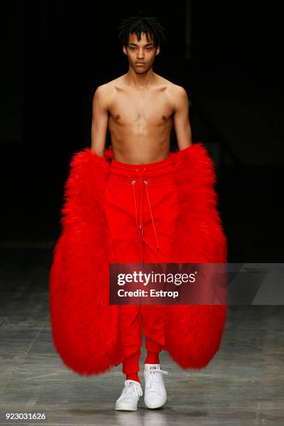 Model walks the runway at the Angel Chen show during Milan Fashion Week Fall/Winter 2018/19 on February 21, 2018 in Milan, Italy.