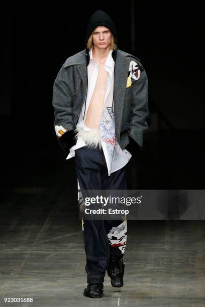 Model walks the runway at the Angel Chen show during Milan Fashion Week Fall/Winter 2018/19 on February 21, 2018 in Milan, Italy.