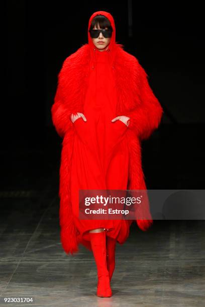 Model walks the runway at the Angel Chen show during Milan Fashion Week Fall/Winter 2018/19 on February 21, 2018 in Milan, Italy.