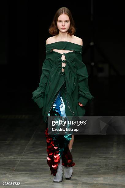 Model walks the runway at the Angel Chen show during Milan Fashion Week Fall/Winter 2018/19 on February 21, 2018 in Milan, Italy.