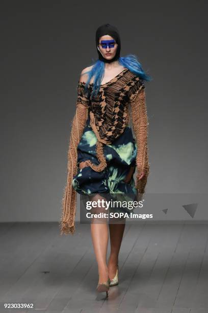 Model walks the runway at the Matty Bovan Show during London Fashion Week February 2018 at BFC Show Space.
