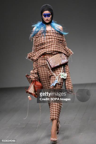 Model walks the runway at the Matty Bovan Show during London Fashion Week February 2018 at BFC Show Space.