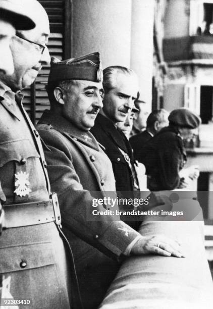 Cerermony of the Association of the Nationalists in Zaragoza. On the balcony of the Hotel Ciudad de Zaragoza: General Jose Moscardo Ituarte, military...