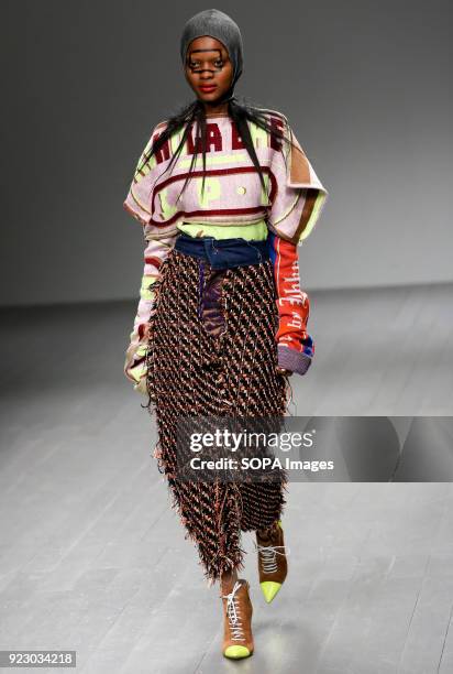 Model walks the runway at the Matty Bovan Show during London Fashion Week February 2018 at BFC Show Space.