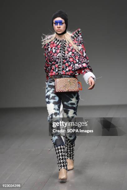 Model walks the runway at the Matty Bovan Show during London Fashion Week February 2018 at BFC Show Space.