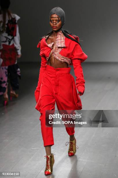 Model walks the runway at the Matty Bovan Show during London Fashion Week February 2018 at BFC Show Space.