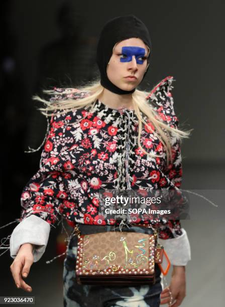 Model walks the runway at the Matty Bovan Show during London Fashion Week February 2018 at BFC Show Space.