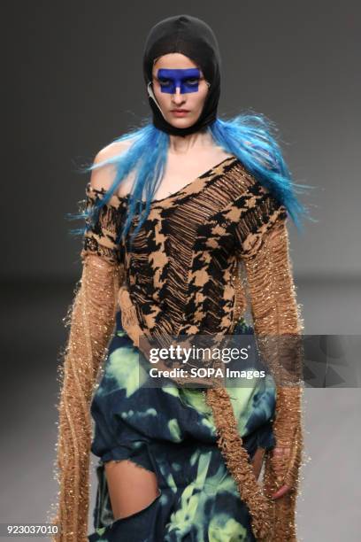 Model walks the runway at the Matty Bovan Show during London Fashion Week February 2018 at BFC Show Space.