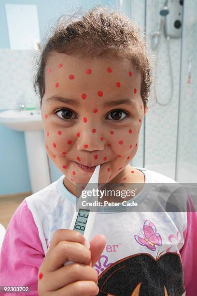 girl with spots and thermometer - pox stock pictures, royalty-free photos & images