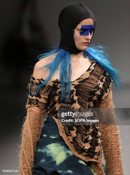 Model walks the runway at the Matty Bovan Show during London Fashion Week February 2018 at BFC Show Space.