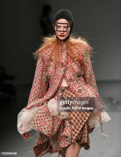 Model walks the runway at the Matty Bovan Show during London Fashion Week February 2018 at BFC Show Space.