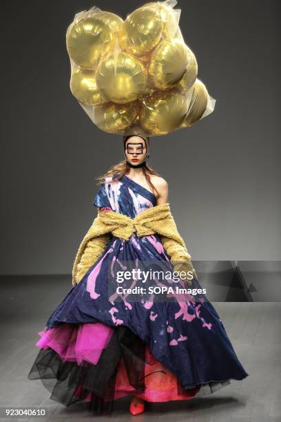 Model walks the runway at the Matty Bovan Show during London Fashion Week February 2018 at BFC Show Space.