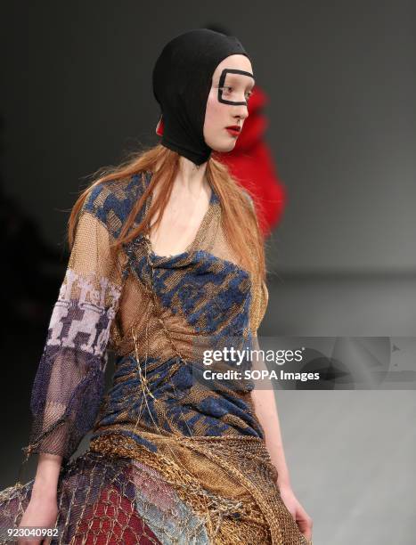 Model walks the runway at the Matty Bovan Show during London Fashion Week February 2018 at BFC Show Space.