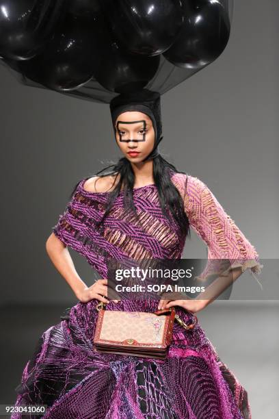 Model walks the runway at the Matty Bovan Show during London Fashion Week February 2018 at BFC Show Space.