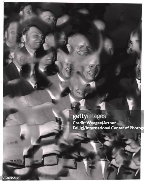 Russian politician and Soviet Premier Nikita Khrushchev smiles as he shares a toast with American politician and US Vice President Richard Nixon...