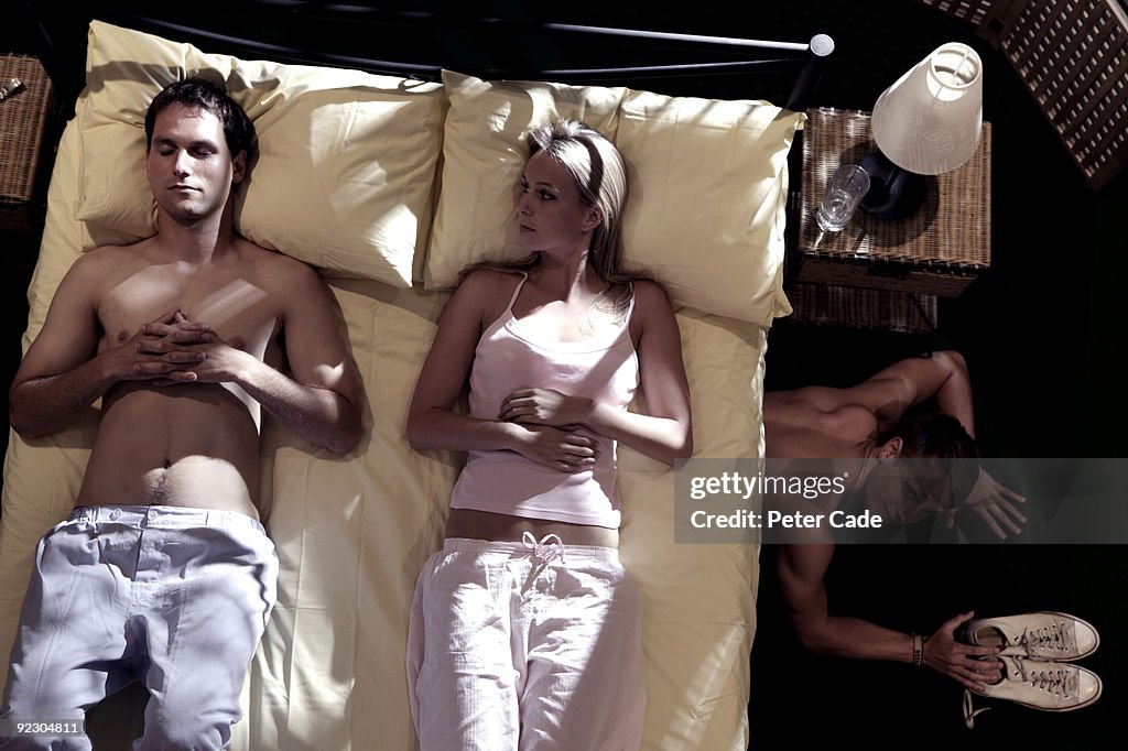 Coulpe in bed, secret lover hiding