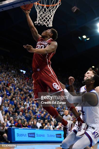 Kameron McGusty of the Oklahoma Sooners lays the ball up against the Kansas Jayhawks at Allen Fieldhouse on February 19, 2018 in Lawrence, Kansas.