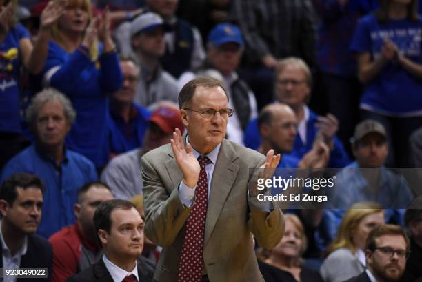 Lon Kruger cheers on his team against the Kansas Jayhawks at Allen Fieldhouse on February 19, 2018 in Lawrence, Kansas.