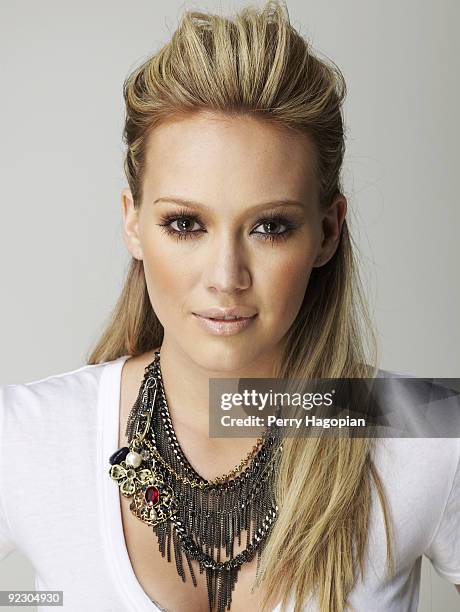 Singer and actress Hilary Duff poses at a portrait session for US Weekly on August 22, 2009 in New York City. PUBLISHED IMAGE.