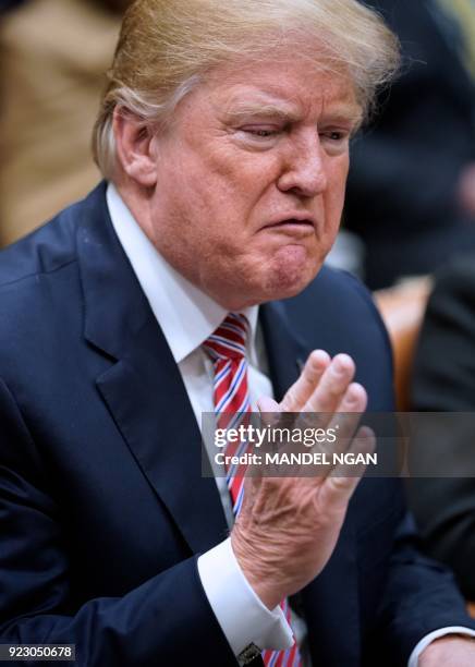 President Donald Trump speaks during a meeting with state and local officials on school safety in the Roosevelt Room of the White House on February...