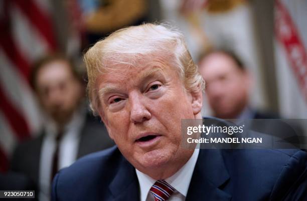 President Donald Trump speaks during a meeting with state and local officials on school safety in the Roosevelt Room of the White House on February...