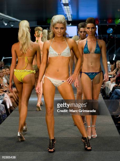 Model showcases a design on the catwalk by Syrene Bikinis during the Sunshine Coast Fashion Festival at the Coastline BMW Showroom on October 23,...