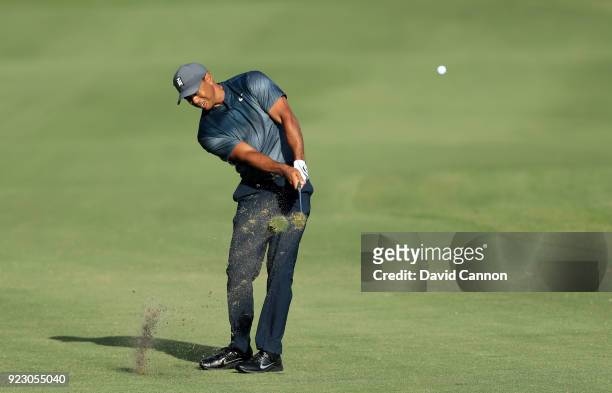 Tiger Woods of the United States plays his second shot on the 13th hole during the first round of the 2018 Honda Classic on The Champions Course at...