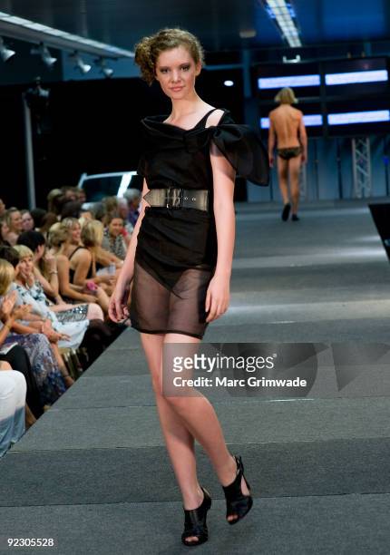 Model showcases a design on the catwalk by Daniel Alexander during the Sunshine Coast Fashion Festival at the Coastline BMW Showroom on October 23,...