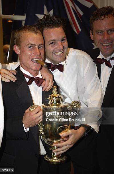 Wimbledon Champion Lleyton Hewitt of Australia celebrates with his friends at the All England Lawn Tennis and Croquet Club Champions Dinner at the...