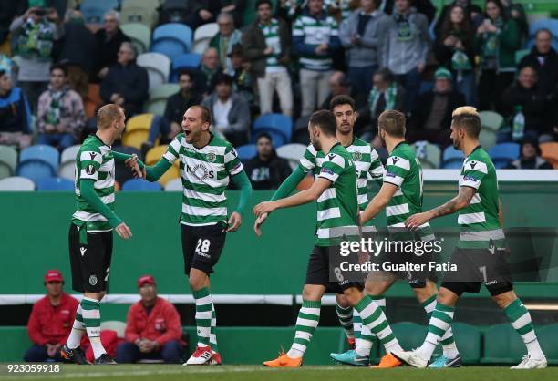 Sporting CP forward Bas Dost from Holland celebrates with teammate Sporting CP defender Jeremy Mathieu from France after scoring a goal during the...