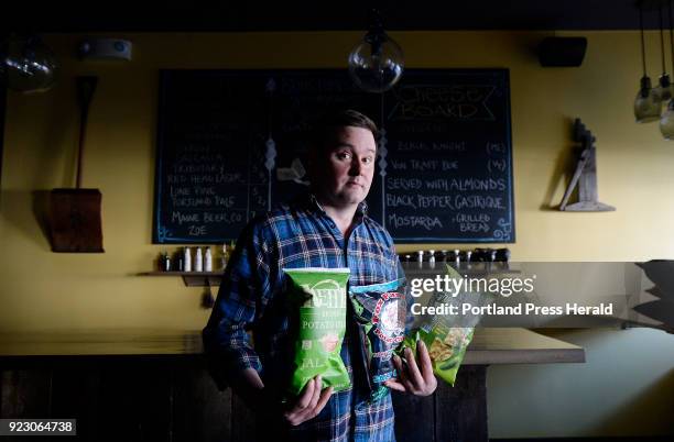 Ben Hasty chef/owner at thistle Pig restaurant in South Berwick with some of his favorite snacks including Kettle Brand Jalapeno Potato Chips, Fox...