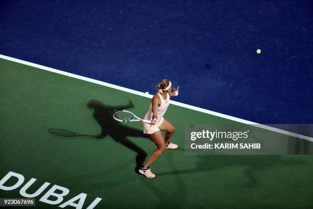 Elena Vesnina of Russia plays the ball to Daria Kasatkina of Russia in their quarter-final tennis match at the WTA Dubai Duty Free Tennis...