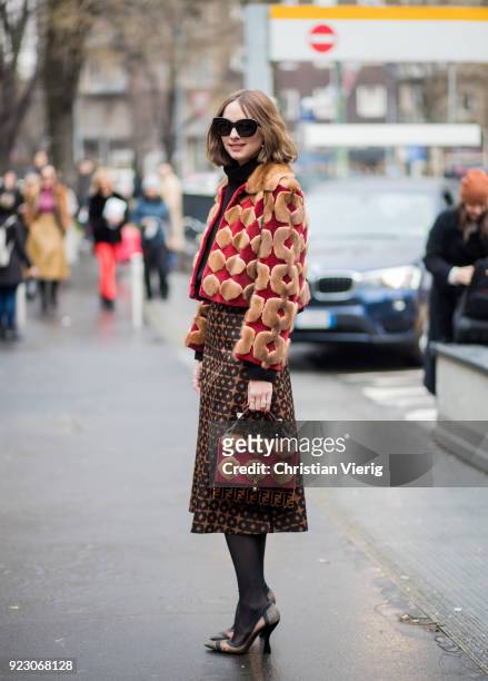 Candela Novembre wearing jacket, Fendi skirt, bag seen outside Fendi during Milan Fashion Week Fall/Winter 2018/19 on February 22, 2018 in Milan,...