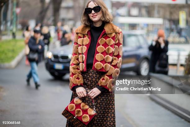 Candela Novembre wearing jacket, Fendi skirt, bag seen outside Fendi during Milan Fashion Week Fall/Winter 2018/19 on February 22, 2018 in Milan,...
