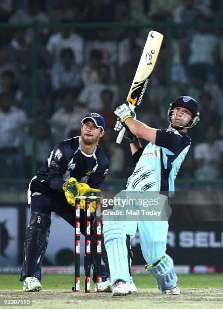 Blues team's Phil Hughes hits a shot during his innings of 35 during their Champions League semi-final against Victoria Bushrangers in New Delhi on...