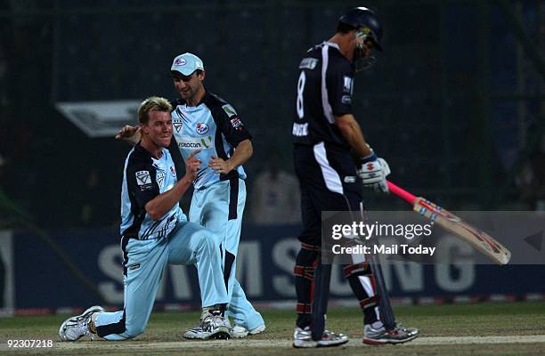 Player Brett Lee of New South Wales team celebrates after taking a wicket during their Champions League semi-final against the Victoria Bushrangers...