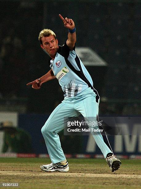 Player Brett Lee of New South Wales team celebrates after taking a wicket during their Champions League semi-final against the Victoria Bushrangers...