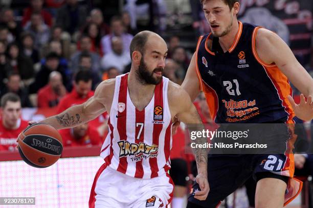 Vassilis Spanoulis, #7 of Olympiacos Piraeus competes with Tibor Pleiss, #21 of Valencia Basket during the 2017/2018 Turkish Airlines EuroLeague...