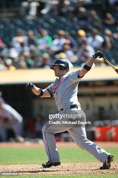 Kelly Shoppach of the Cleveland Indians bats during the game against the Oakland Athletics at the Oakland Coliseum on September 19, 2009 in Oakland,...