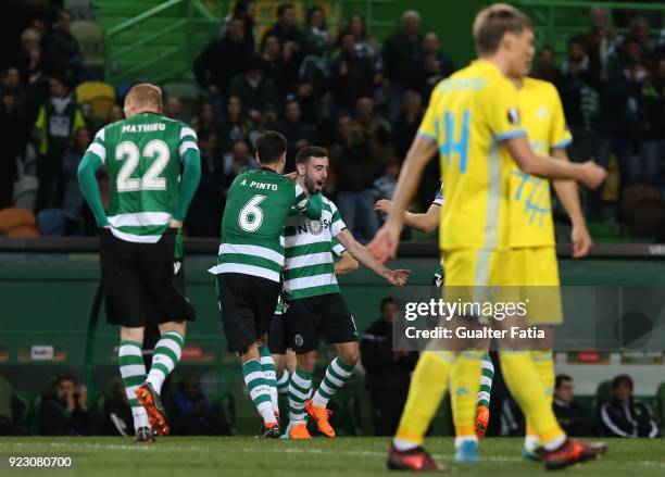 Sporting CP midfielder Bruno Fernandes from Portugal celebrates with teammates after scoring a goal during the UEFA Europa League match between...