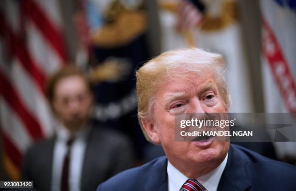 President Donald Trump speaks during a meeting with state and local officials on school safety in the Roosevelt Room of the White House on February...