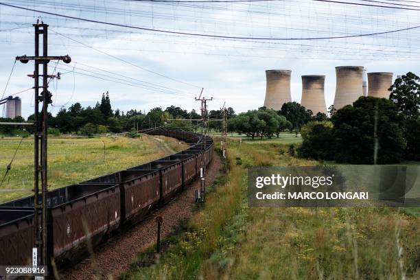 Freight train leaves the Eskom Power plant in Hendrina on February 22 after having discharged its load of coal. - The name of Eskom, Africa's largest...